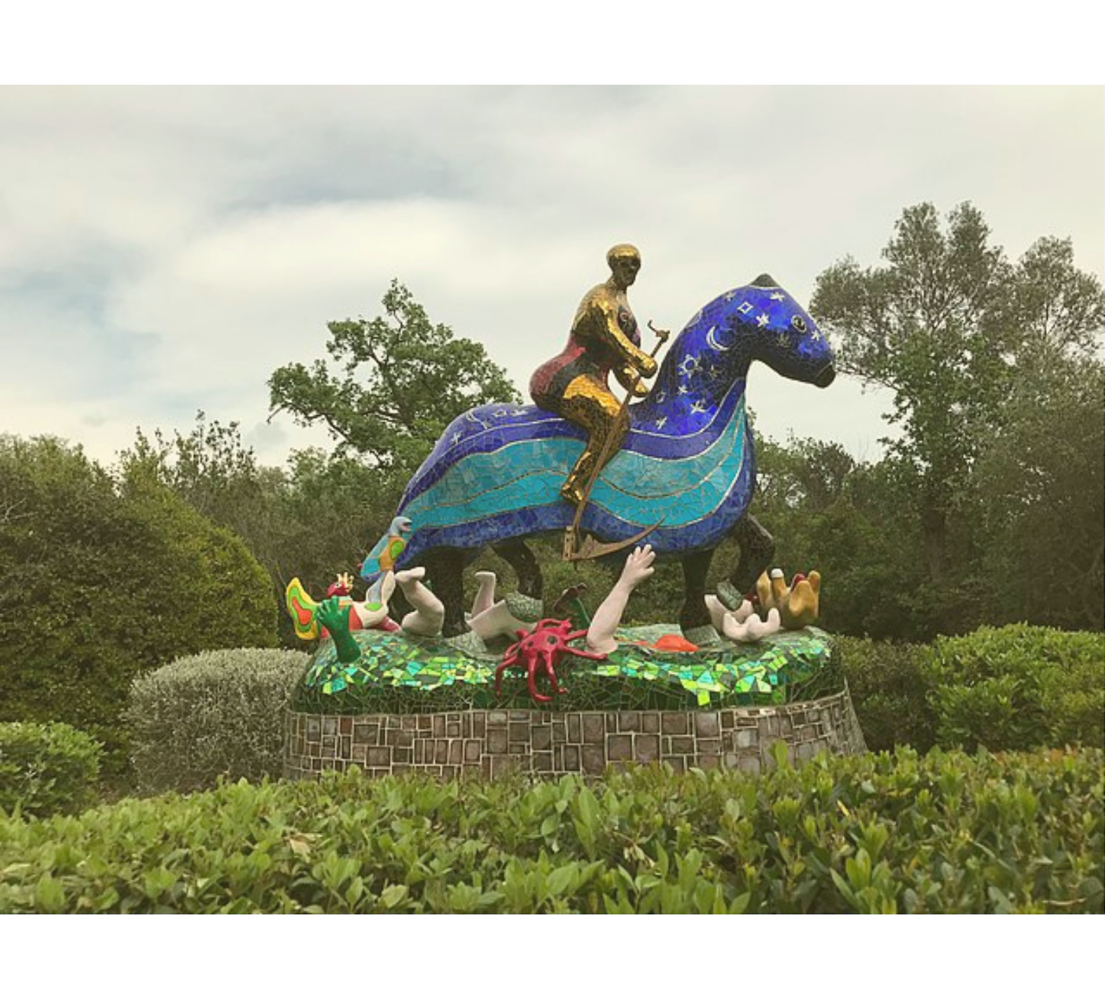 Sculpture of a woman on horseback in Niki de Saint Phalle’s Tarot Garden in Tuscany.