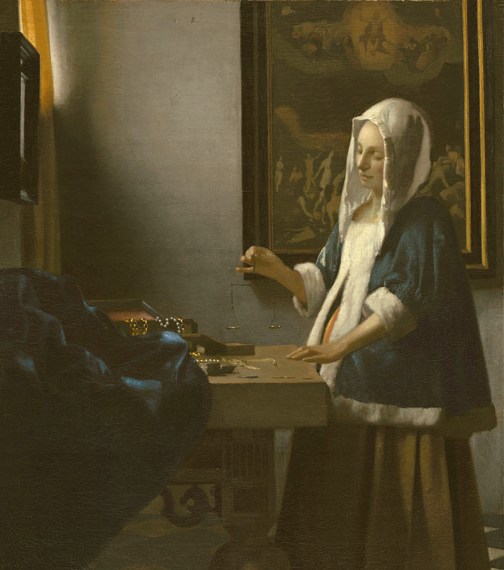 johannes vermeer woman holding a balance 1662 1663
